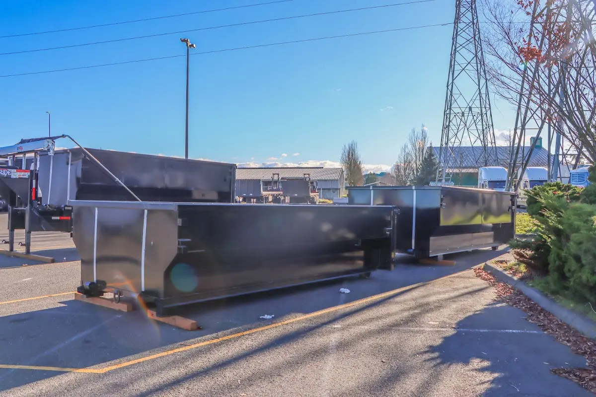 Roll-off dumpster ready for waste disposal at job site for Construction Dumpster Rental in Loves Park